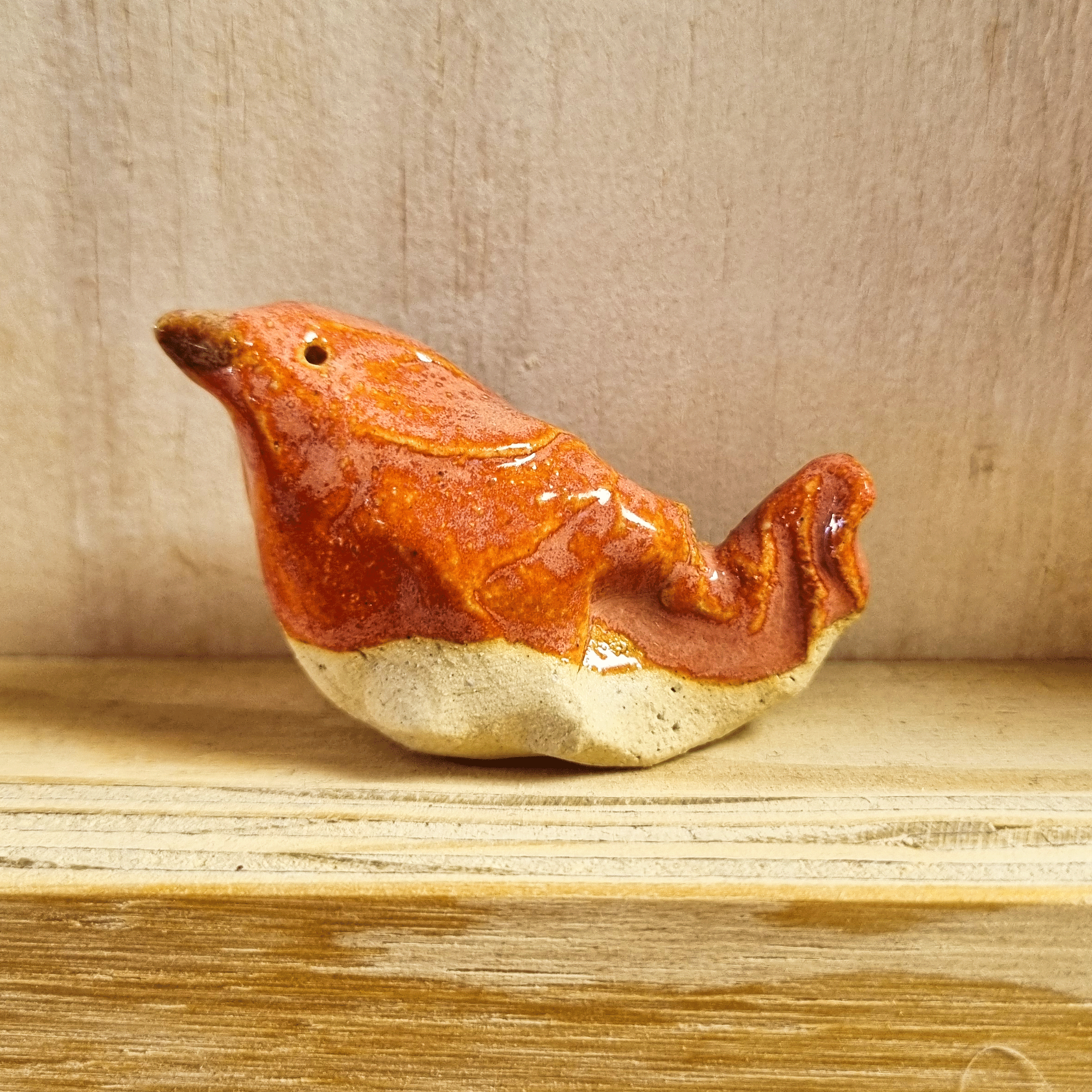 miniatureluurtje vogel roze