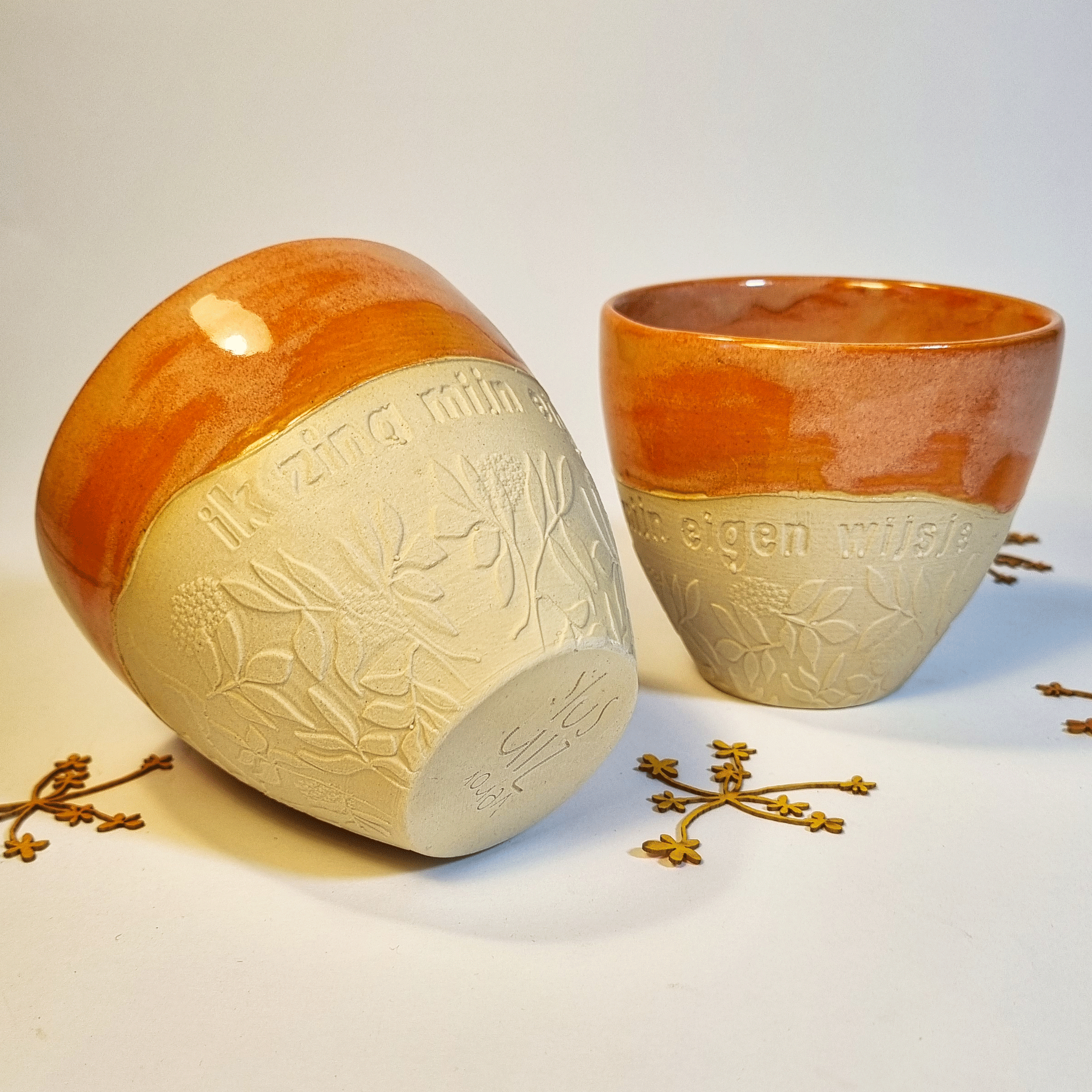 helegrote goedezin mok eigenwijsje oranje