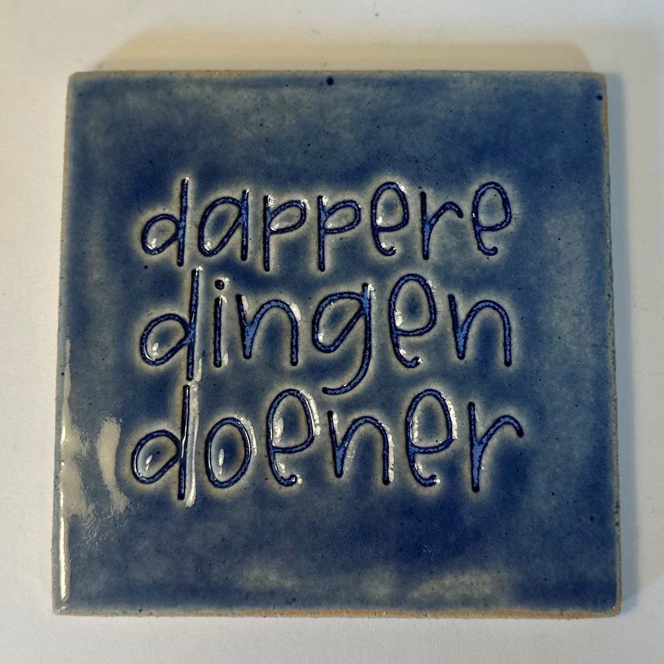 mooiewoordentegel dapperedingendoener donkerblauw